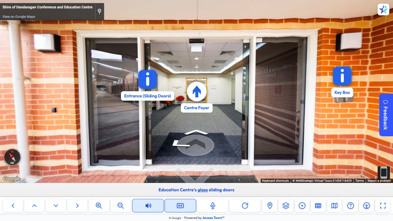 Access Tours walkthrough of the Shire of Dandaragan Conference and Education Centre: the entrance with labels for the sliding doors, the key box and the way to the centre foyer, with a caption below.